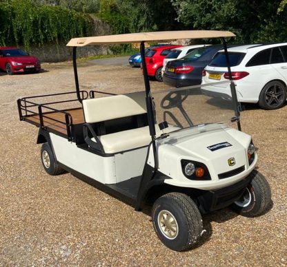 Cushman-Shuttle-2-white-brown-flatbed-front-right